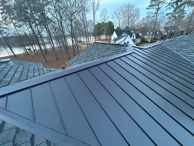 Metal chimney with a metal cap